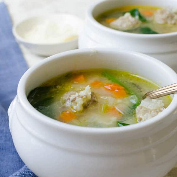 Homemade Italian Wedding Soup in a soup bowl.