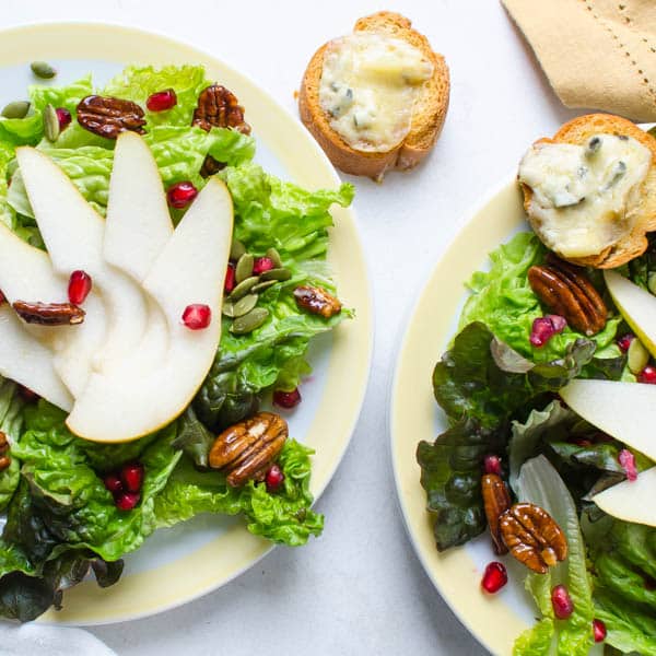 Pear Pomegranate Salad with Maple Dijon Dressing and Gorgonzola Croutons