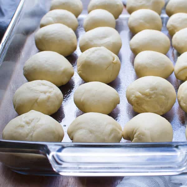 rolling dough into rounds