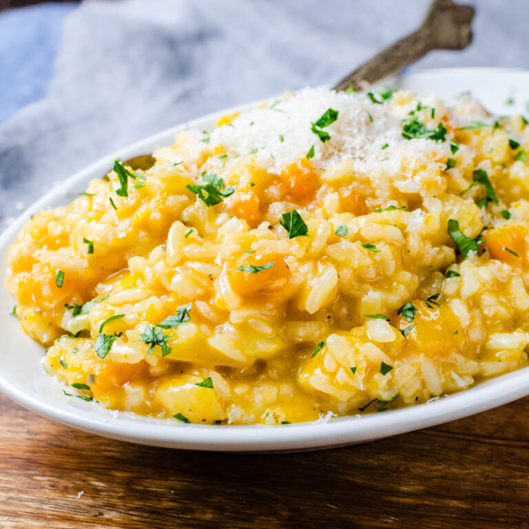 Serving squash risotto with extra parmesan cheese.