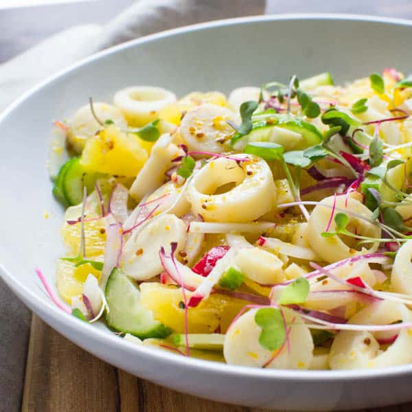 Citrusy Hearts of Palm Salad in a white bowl