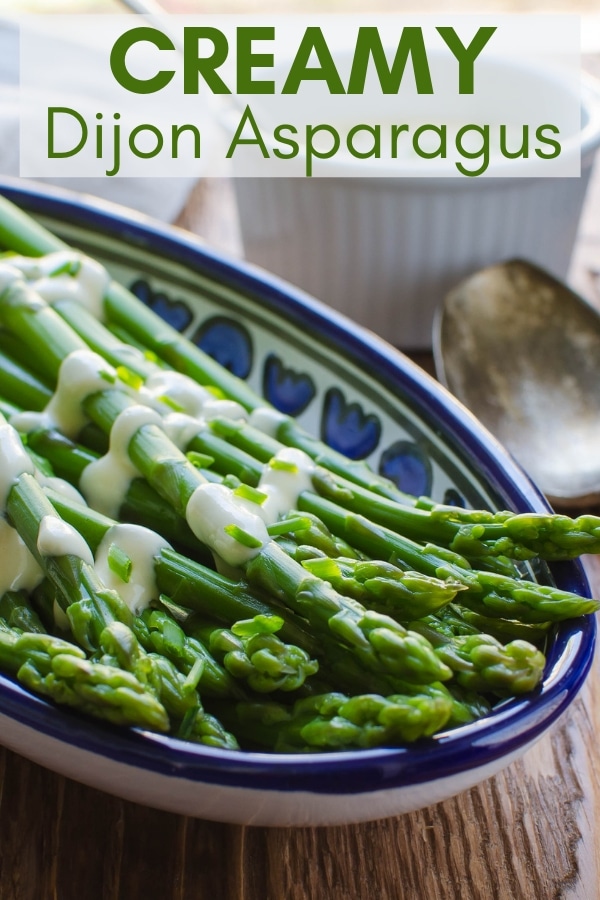 Need an easy sauce for asparagus? The dijon sauce for this Creamy Dijon Asparagus takes about 2 minutes to assemble and makes a great dressing for steamed or blanched asparagus. Serve hot or cold for a delicious gluten-free, vegetarian side dish. #asparagusrecipes #blanchedasparagus #saucerecipes