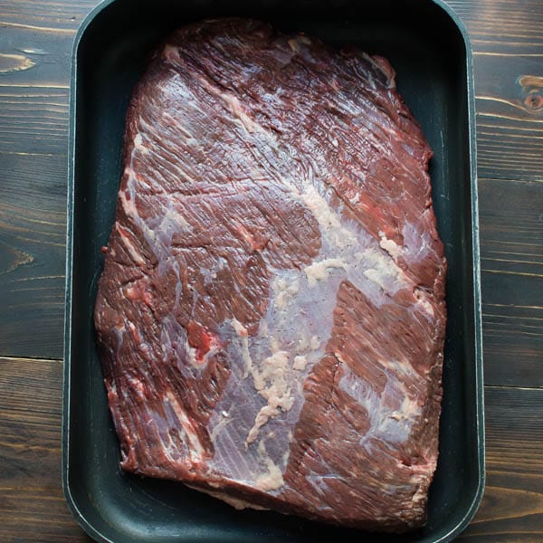 beef brisket in a pan.