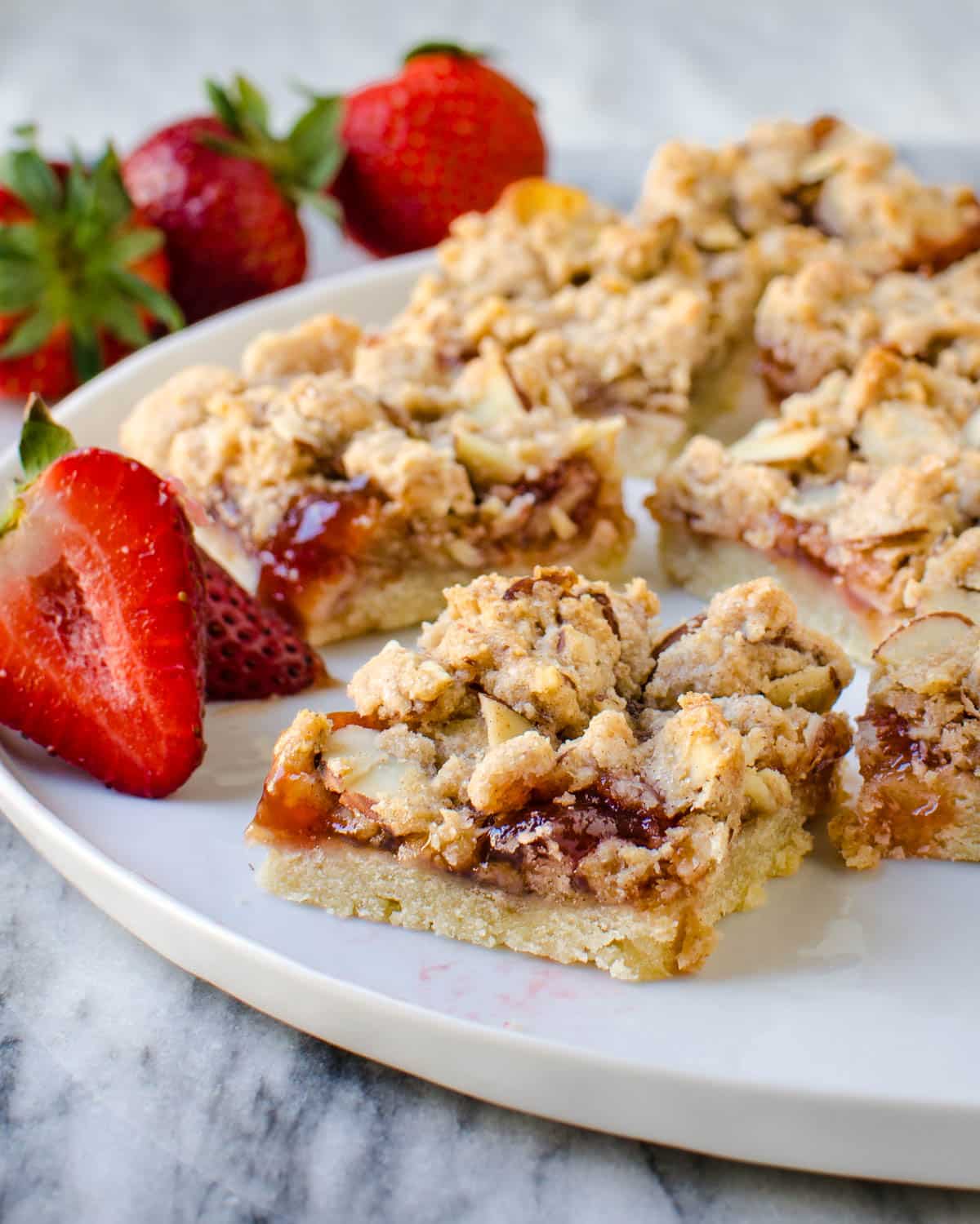 Strawberry Crumb bars on a serving platter.