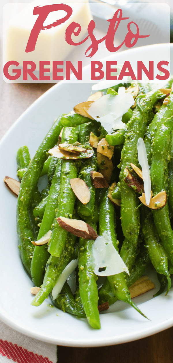 This blanched green beans recipe is an easy Spring side dish with only 5 ingredients. Spring Pesto Green Beans are ready in 10 minutes - perfect for weeknights. These savory, healthy green beans will be a favorite with your family. #greenbeans #pesto #almonds #parmigianoreggiano #parmesan #granapadana #cheese #gratedcheese #basil #olive oil #homemadepesto #blanchedbeans #haricotsvert #sidedish #healthysidedish #fastsidedish #easysidedish #springsidedish #quicksidedish #5ingredientrecipe 