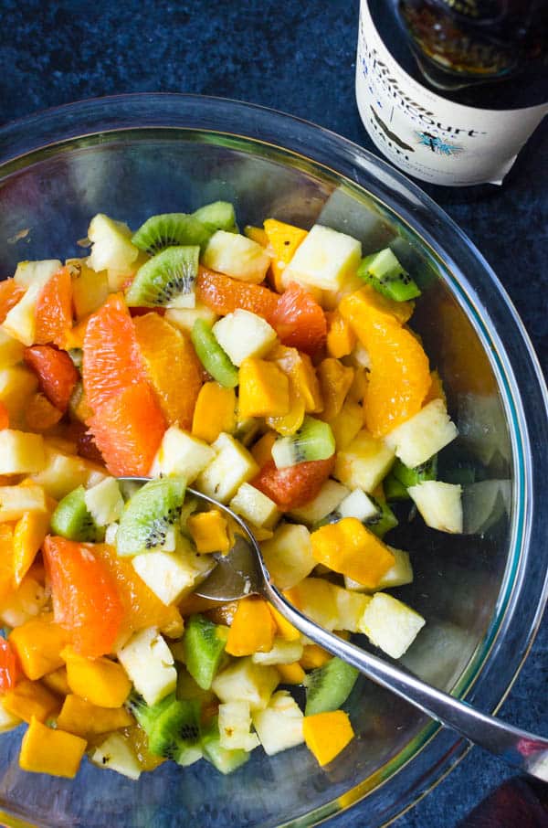 tossing the Rum Spiked Tropical Fruit Salad-7