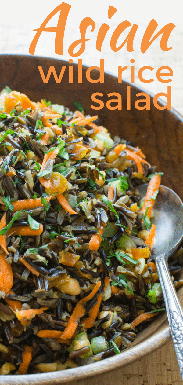 Step out of your potluck side dish routine with this Asian Wild Rice Salad with Ginger Soy Dressing. This easy rice salad w/ Asian dressing recipe is tops. #wildrice #ricesalad #apricots #driedapricots #asianfood #asianrecipes #soy #ginger #asiandressing #soygingerdressing #peanuts #potlucksides #salads #sidedish #picnic #barbecue #carrots #celery #healthysidedish #vegansides #vegetariansides