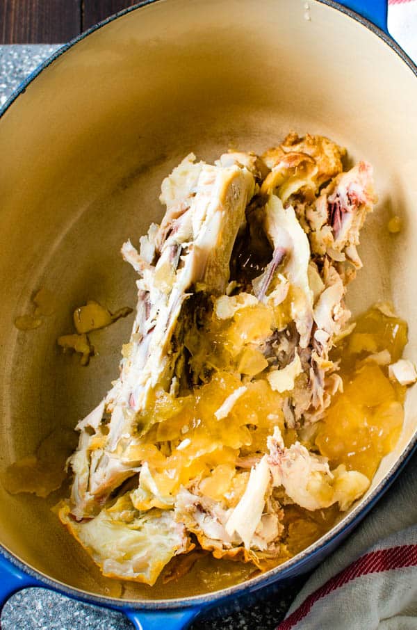 chicken carcass and natural gelatin in a large dutch oven.