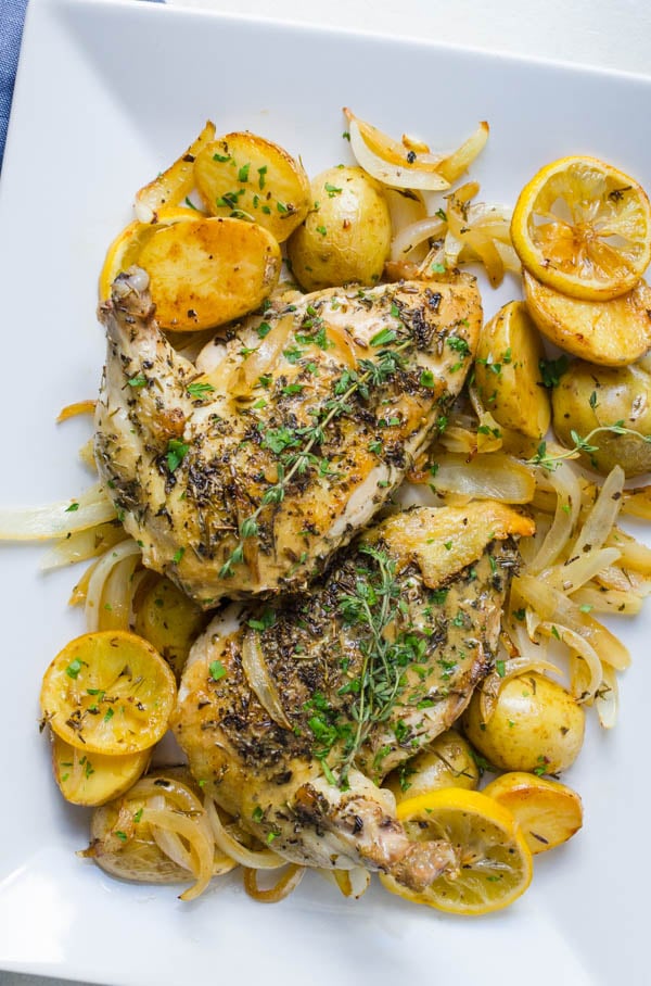 Pan Roasted Chicken Breasts with Dijon Sauce and potatoes and onions.