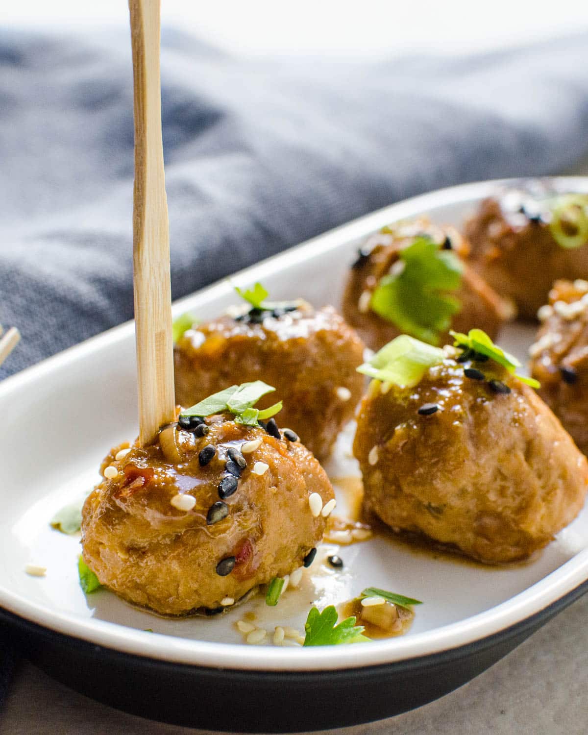 Asian Meatballs served with toothpicks.