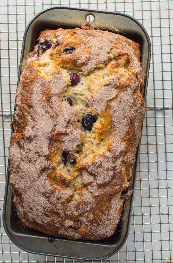 Best Blueberry Banana Bread recipe cooling on a rack.
