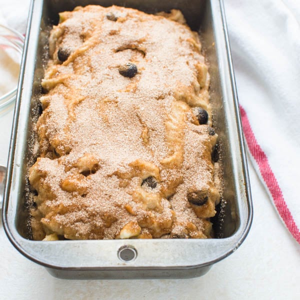 blueberry banana bread recipe in a loaf pan.