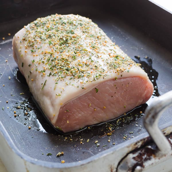 herb crusted pork loin before cooking.