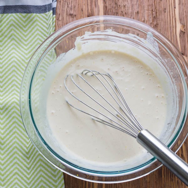 whisking ingredients for Homemade Buttermilk Ranch Dressing