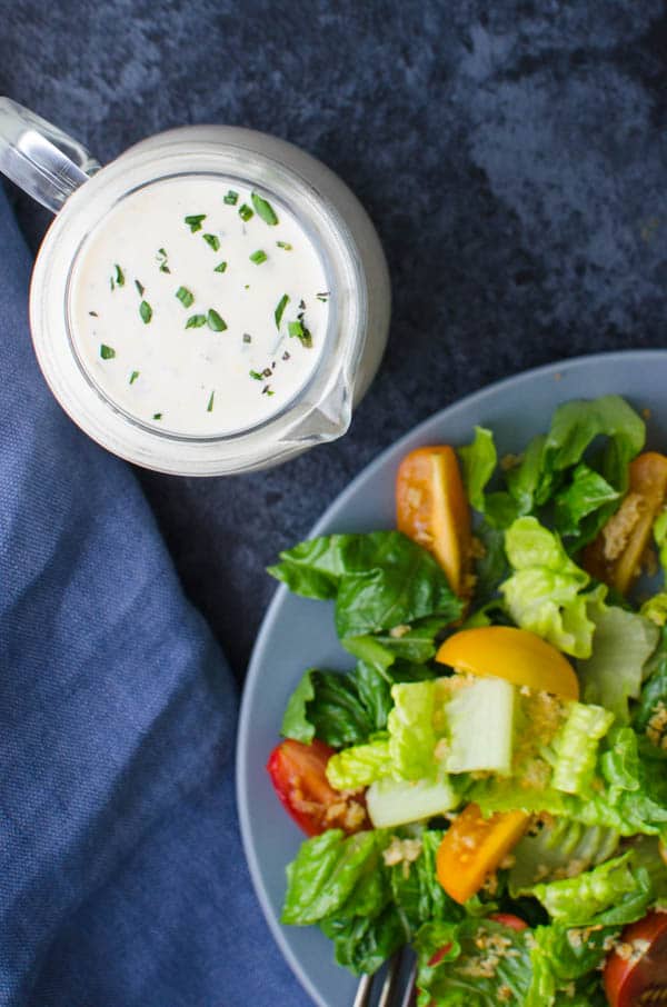 Homemade Buttermilk Ranch Dressing with a salad.