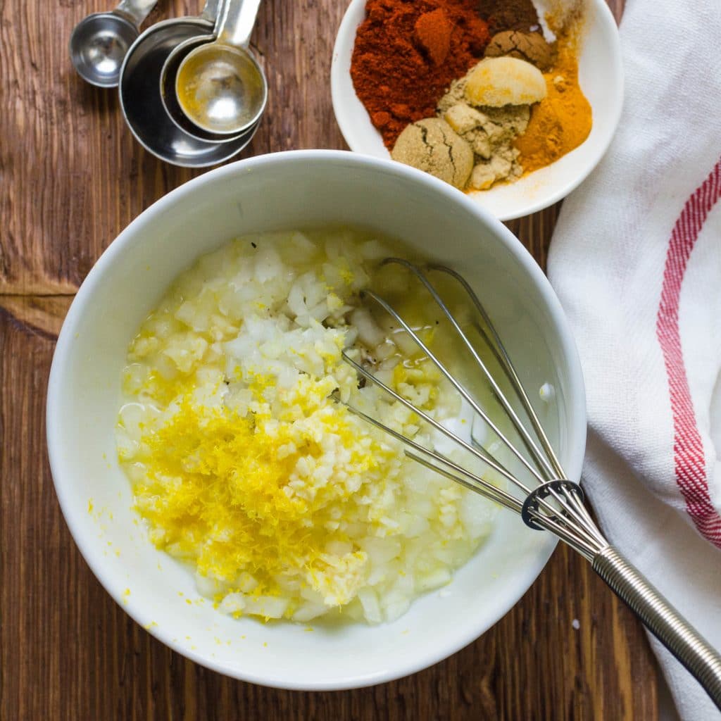 garlic, onions, and lemon in tandoori marinade.