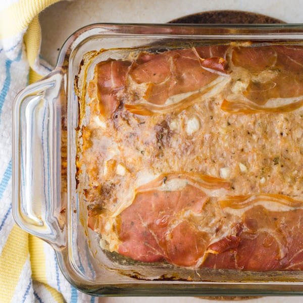 cooked meatloaf in loaf pan.