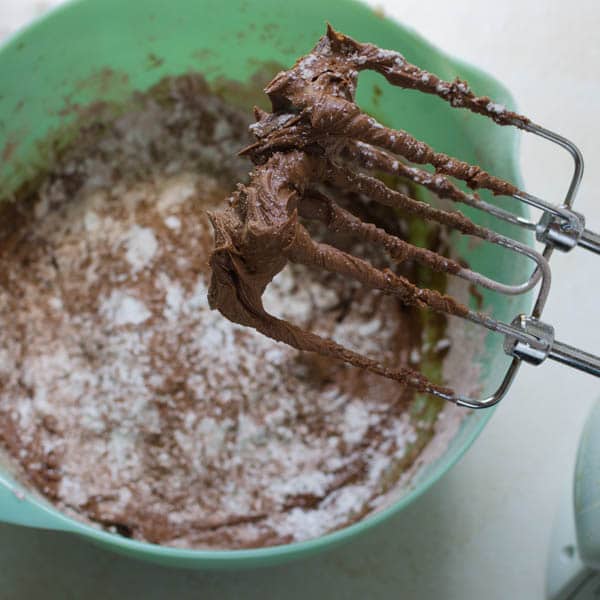 beating the milk chocolate frosting