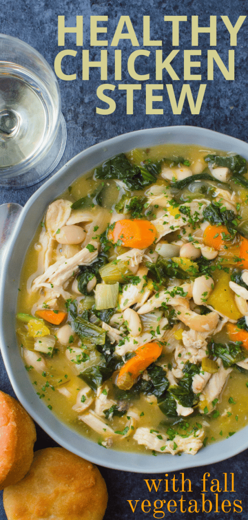 The best chicken stew is a healthy chicken stew. Loaded with chicken and fall vegetables, this easy chicken stew is a one pot meal to savor. One of our favorite fall chicken recipes! #fallrecipes #fallstew #chickenstew #easychickenstew #onepotmeal #onepotrecipe #healthychickenstew #bestchickenstew #creamychickenstew #acornsquash #chickenbreasts #carrots #whitebeans #escarole