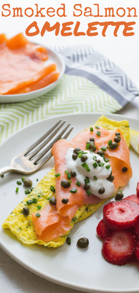 Quick, healthy & delish, this smoked salmon omelette is a great start to the day. An herb omelette embellished with buttery salmon, capers, chives & lemon. #omelette