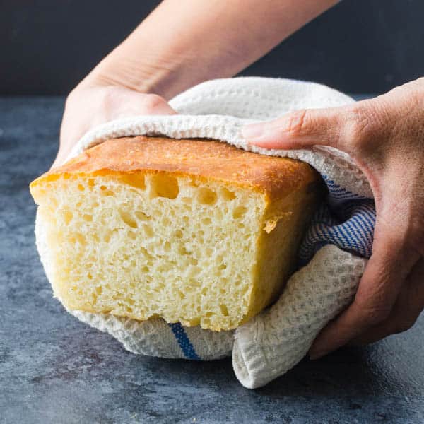 Amish bread recipe wrapped in a towel.