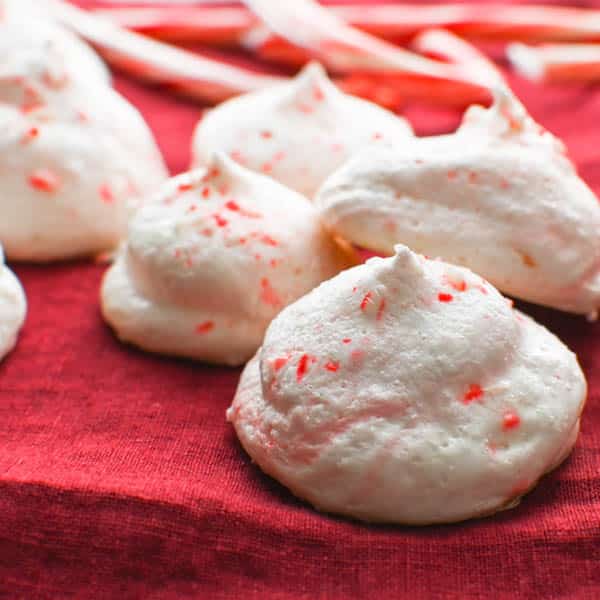christmas meringues on a red napkin.