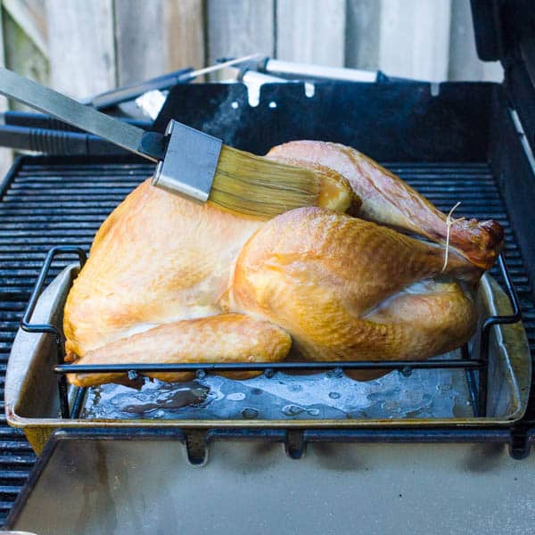 basting the whole smoked turkey.