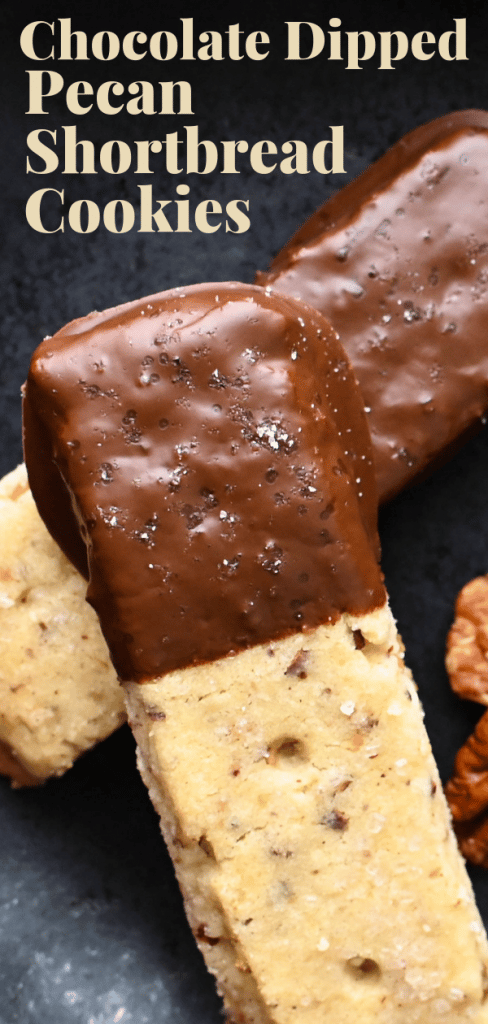 Love homemade shortbread? These pecan shortbread cookies will be your new favorite. With dark chocolate & sea salt, theyre a great Christmas Shortbread. #christmasshortbread #homemadeshortbread #pecanshortbreadcookies #christmascookies #pecans #darkchocolate #chocolatedippedcookies #cookiesforsanta