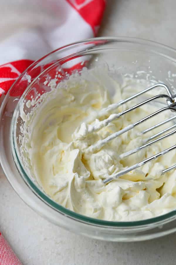 Whipping cream with sugar and Amaretto.