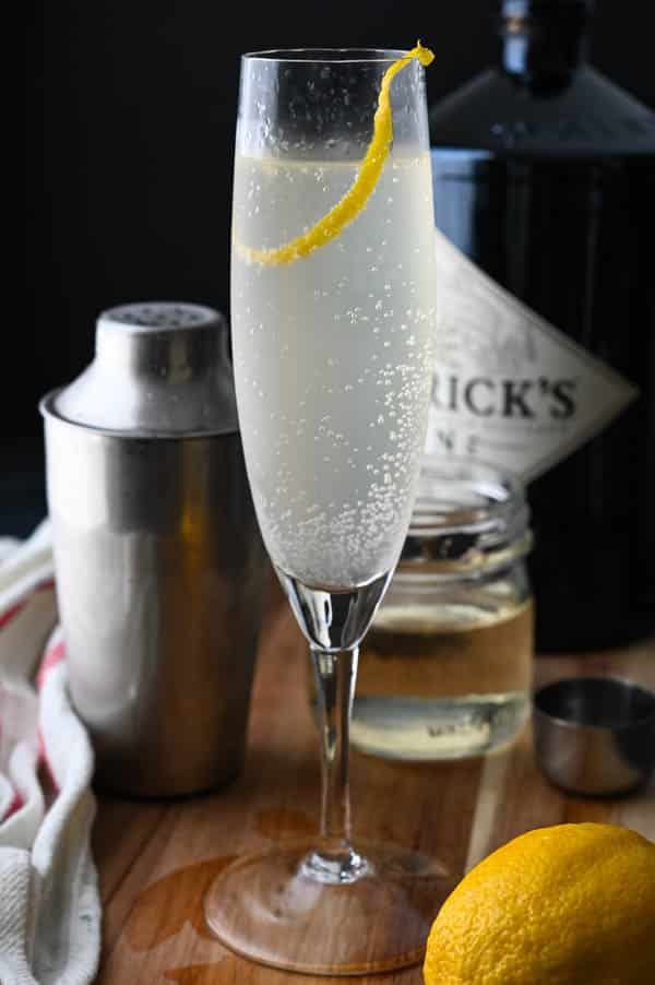 The French 75 - A Classic Gin and Champagne Cocktail - Garlic &amp; Zest