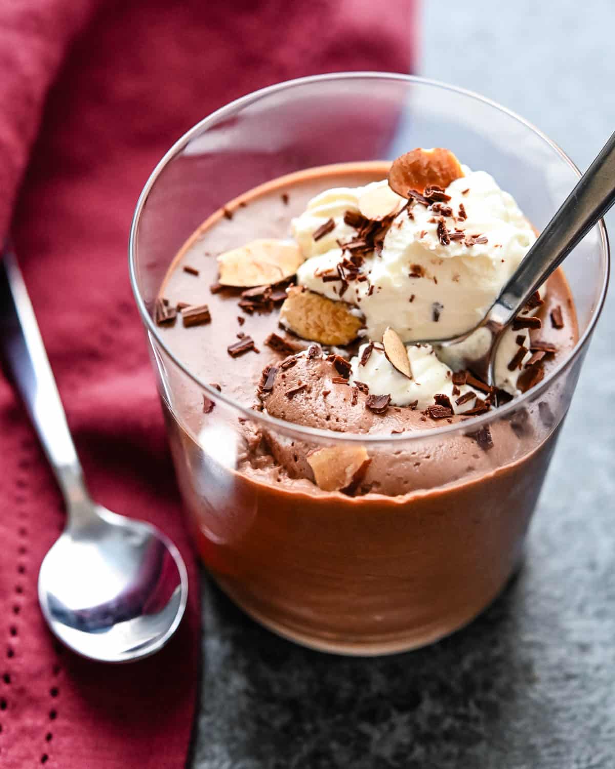 a homemade chocolate mousse with whipped cream.
