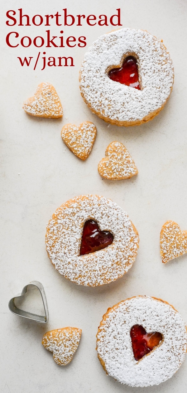 If you like cookies and jam, these hazelnut shortbread cookies with jam are festive, delicious, jam-filled cookies. Use Linzer cookie cutters to make 'em.#hazelnutspicecookies #shortbreadcookieswithjam #jamfilledcookies #linzercookiecutter