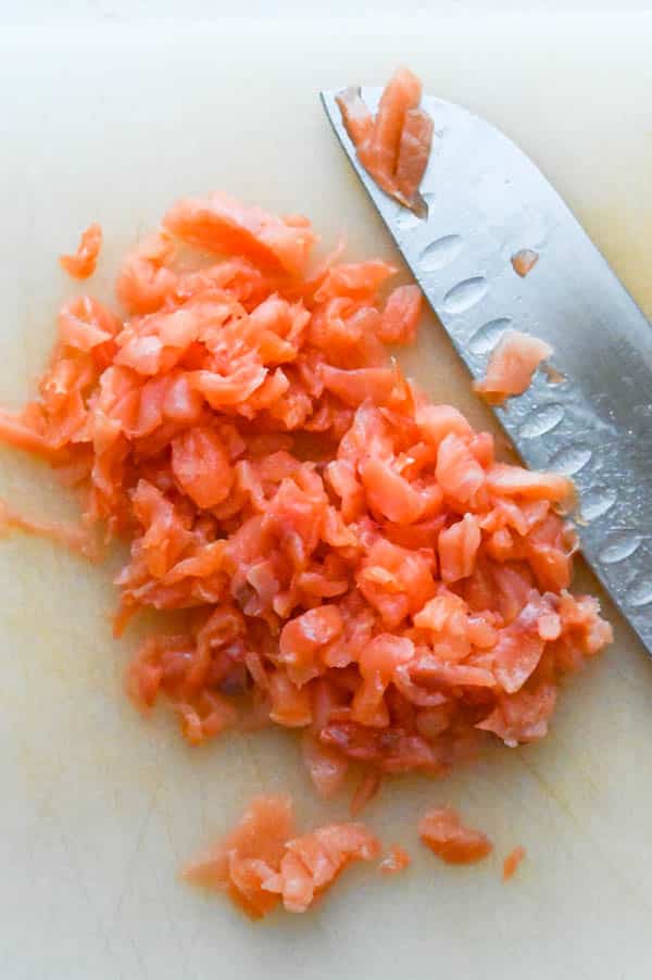 chopping the best smoked salmon.