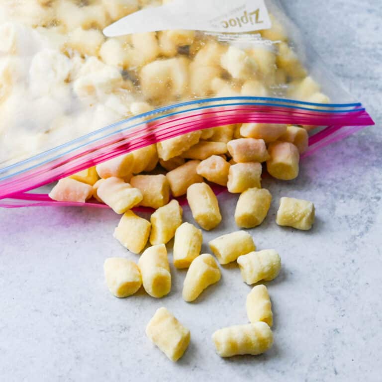 A plastic zip top bag of frozen potato gnocchi.