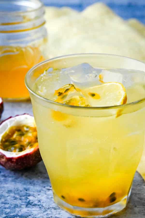 Homemade lemonade with passion fruit and garnishes.