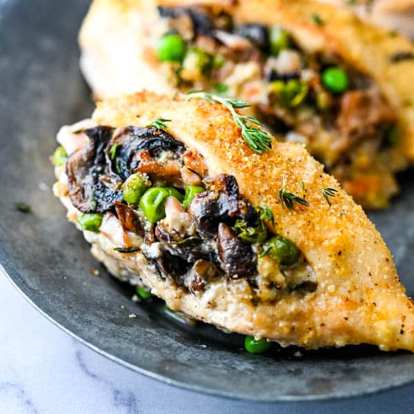 Baked Stuffed Chicken Breast with Ham, Peas and Mushrooms