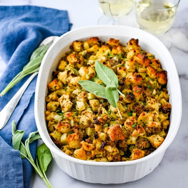 apple sausage bread stuffing in a casserole dish.
