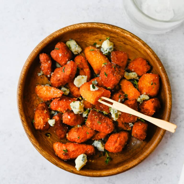 A platter of fried sweet potato gnocchi and blue cheese.