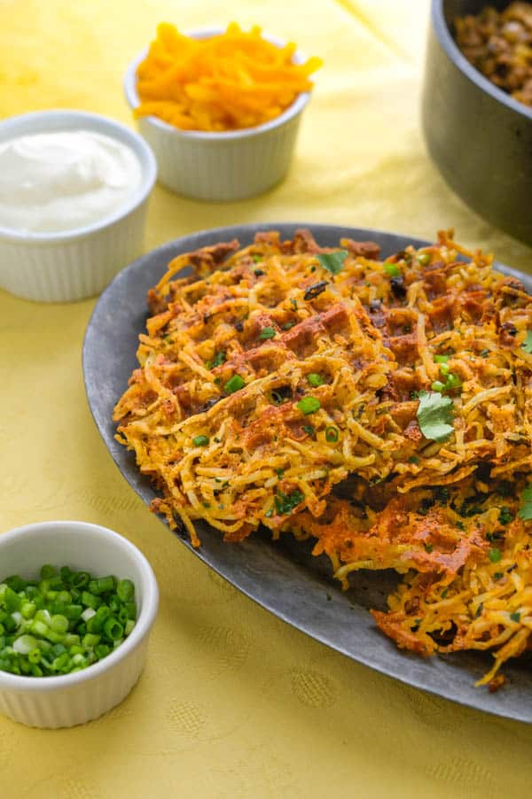 crispy hash browns on a platter. Perfect for family dinners.