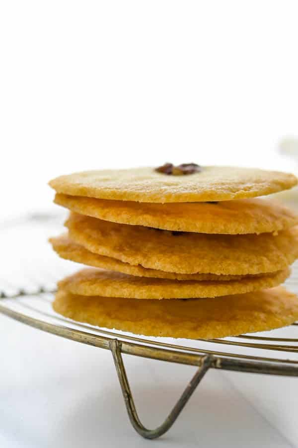 A stack of the small batch sugar cookies to show how thin they are.