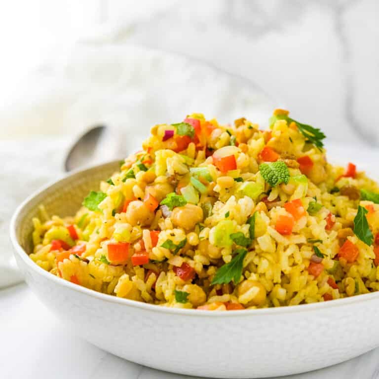 A bowl of curried rice salad.