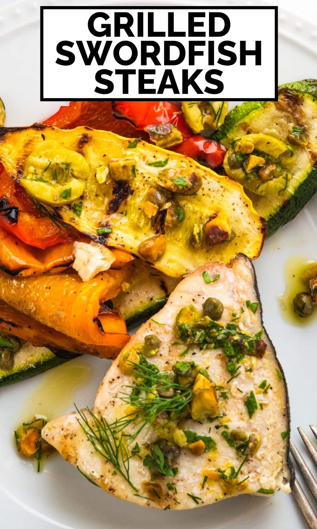 A Pinterest Pin of Grilled swordfish steaks with olive relish ad grilled vegetables on a plate.
