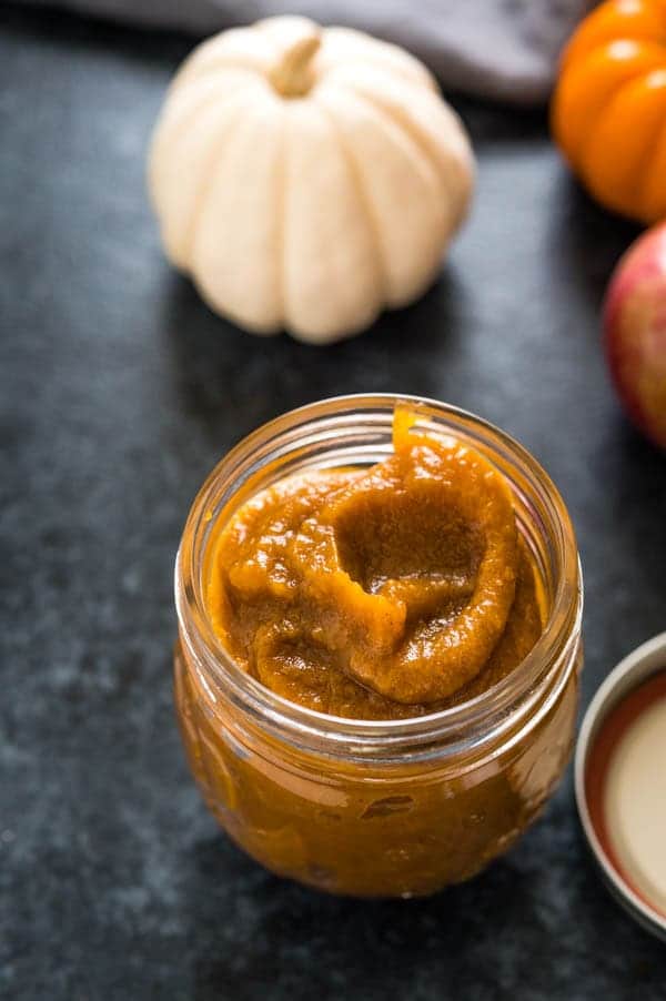 a jar of Homemade pumpkin and apple spread in a jar.