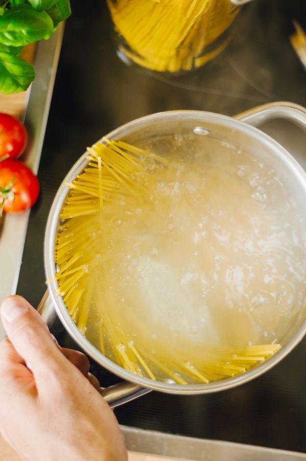boiling pasta water is an easy way to thin a thick chunky spaghetti sauce.