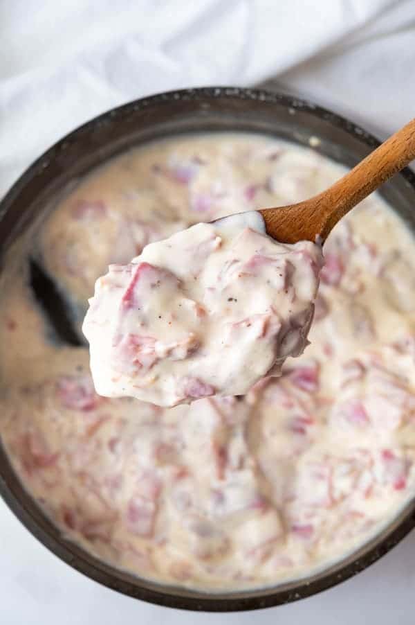 creamed chipped beef in a skillet.