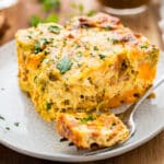 Serving the green chile egg casserole on a plate.