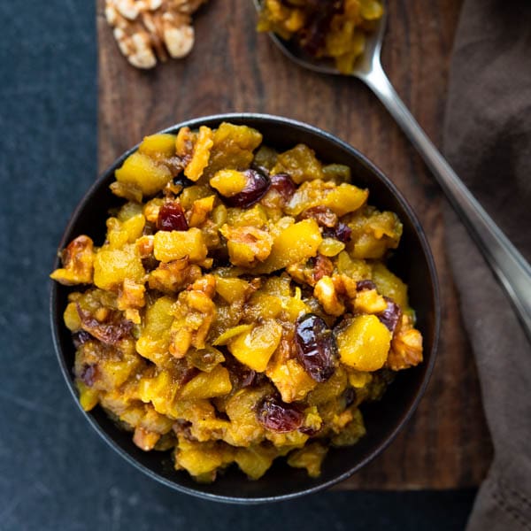 Curried Apple Walnut Cranberry Chutney in a bowl.