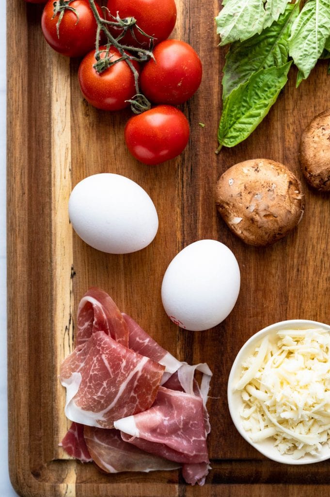 Italian ham, cheese eggs and veggies for an omelette.