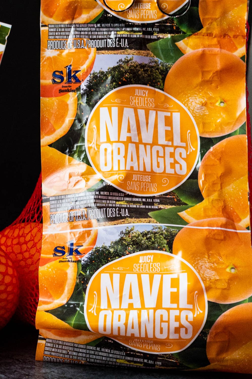 a bag of Sunkist Navel oranges.