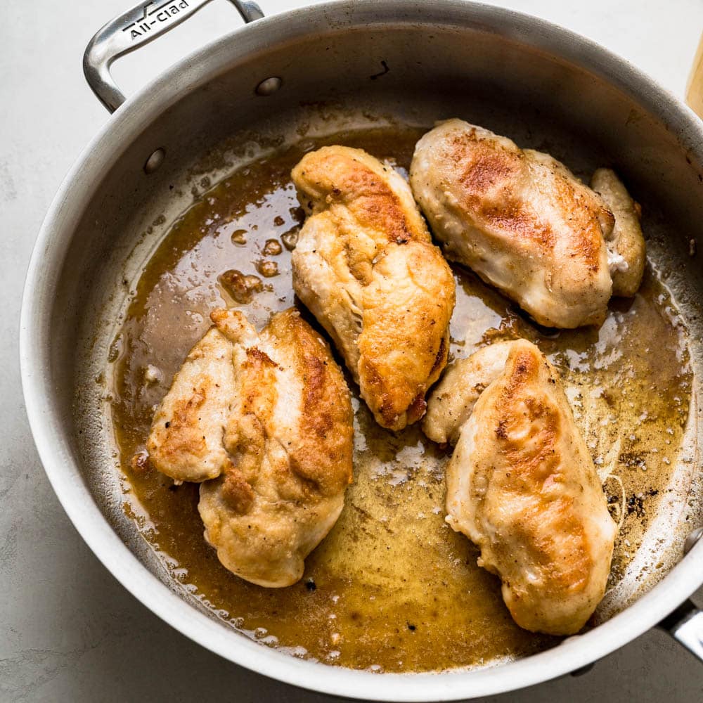 seared  poultry  in the pan with reduced wine.